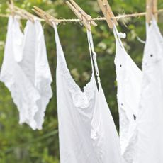 Washing line with white clothing hanging from it