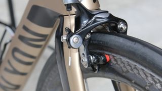 Shimano's direct-mount Dura-Ace caliper holds a non-Mavic pad for the carbon brake track.