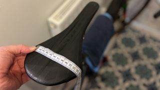 Bike saddle with measuring tape