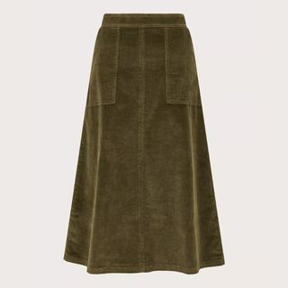 A cutout of an A-line khaki cord skirt on a white background