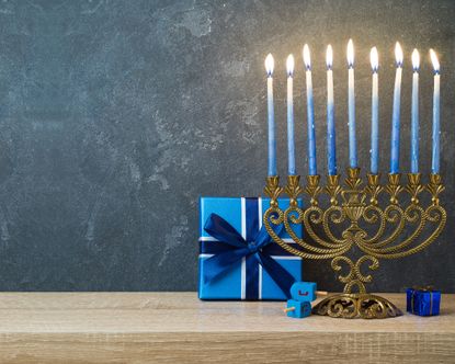 Hanukkah centerpiece with menorah candle