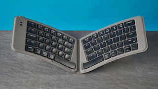A black Keychron B11 Pro foldable keyboard