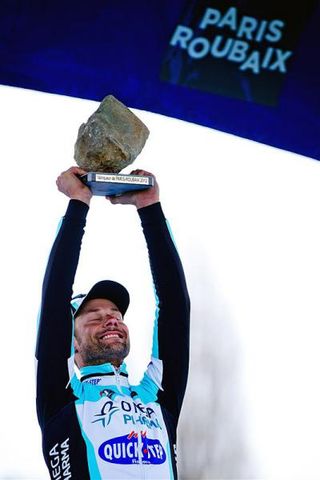 Four-time Paris-Roubaix champion Tom Boonen lets it all sink in the podium.