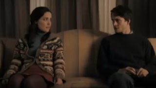 Rose Byrne and Hugh Dancy sitting slightly apart from each other in Adam