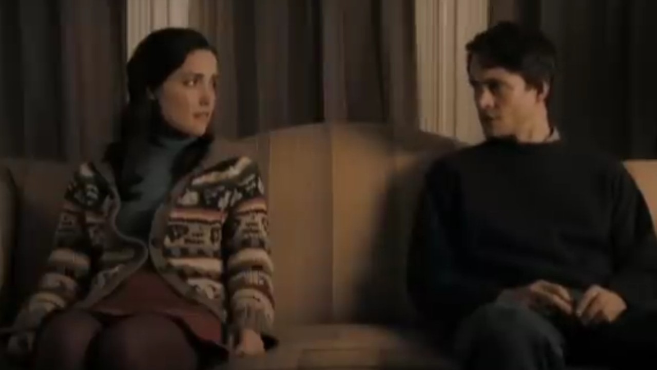 Rose Byrne and Hugh Dancy sitting slightly apart from each other in Adam