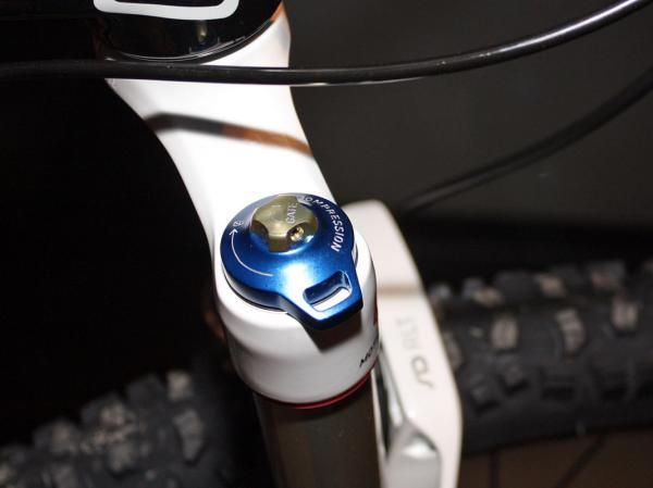 The compression dial is indexed for more precise adjustments.