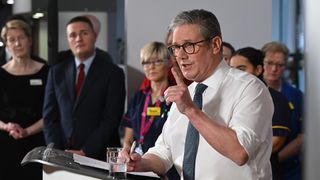 UK prime minister Keir Starmer gives a speech on reducing NHS wait times while watched by Wes Streeting, Secretary of State for Health and Social Care as they visit a healthcare provider in Surrey on January 6, 2025 in Epsom, United Kingdom.