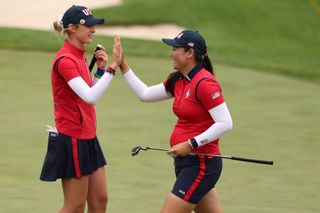 Allisen Corpuz and Nelly Korda high five