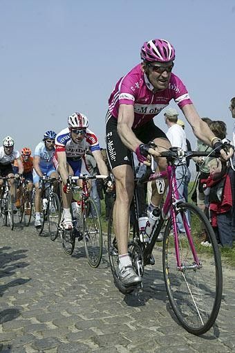 Rolf Aldag (T-Mobile) on the Eine pave