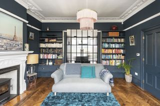 living room with decorative mouldings