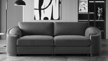 a black and white image of a living room sofa