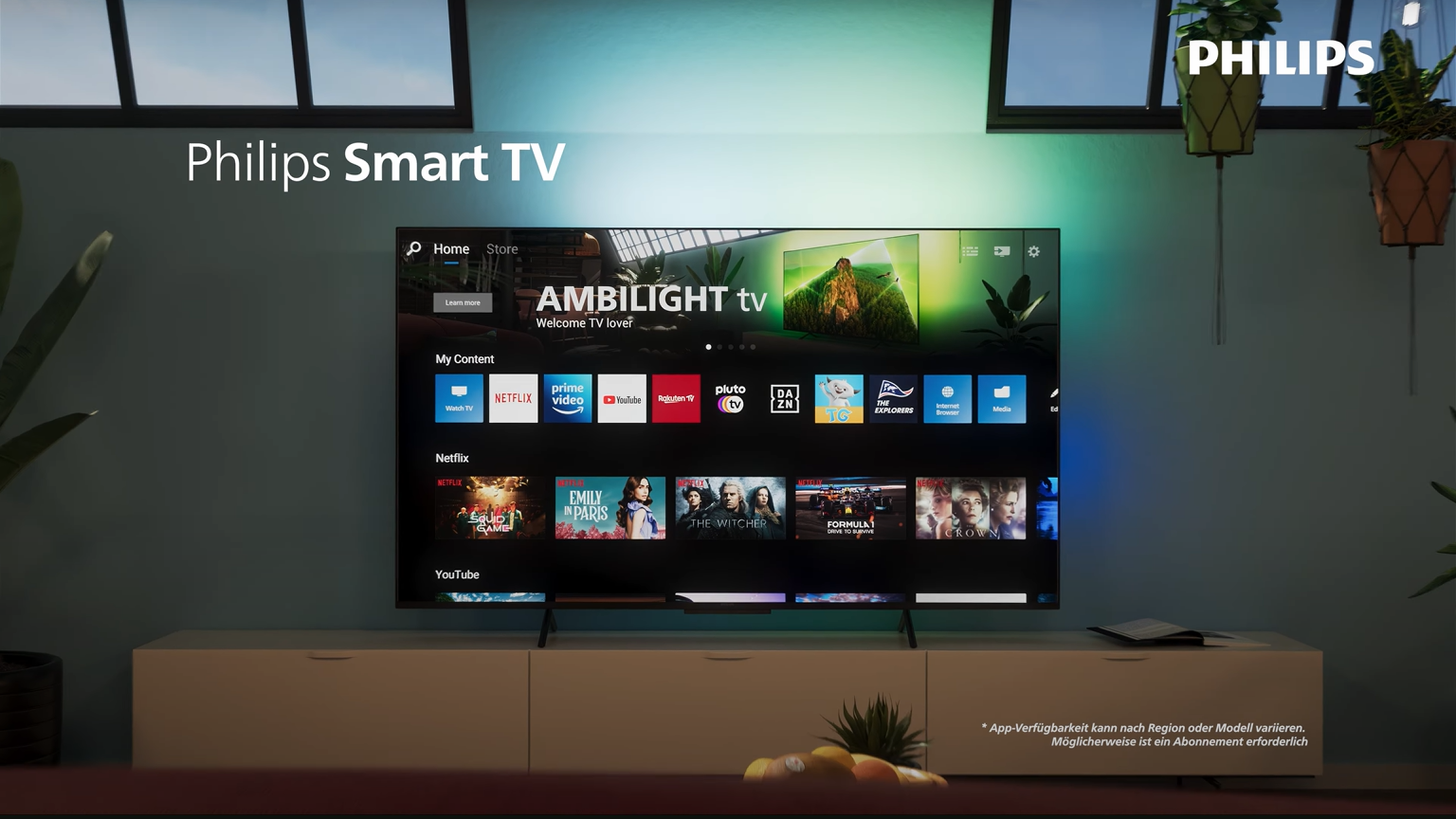 Philips smart TV on a media unit with the Titan OS home page visible
