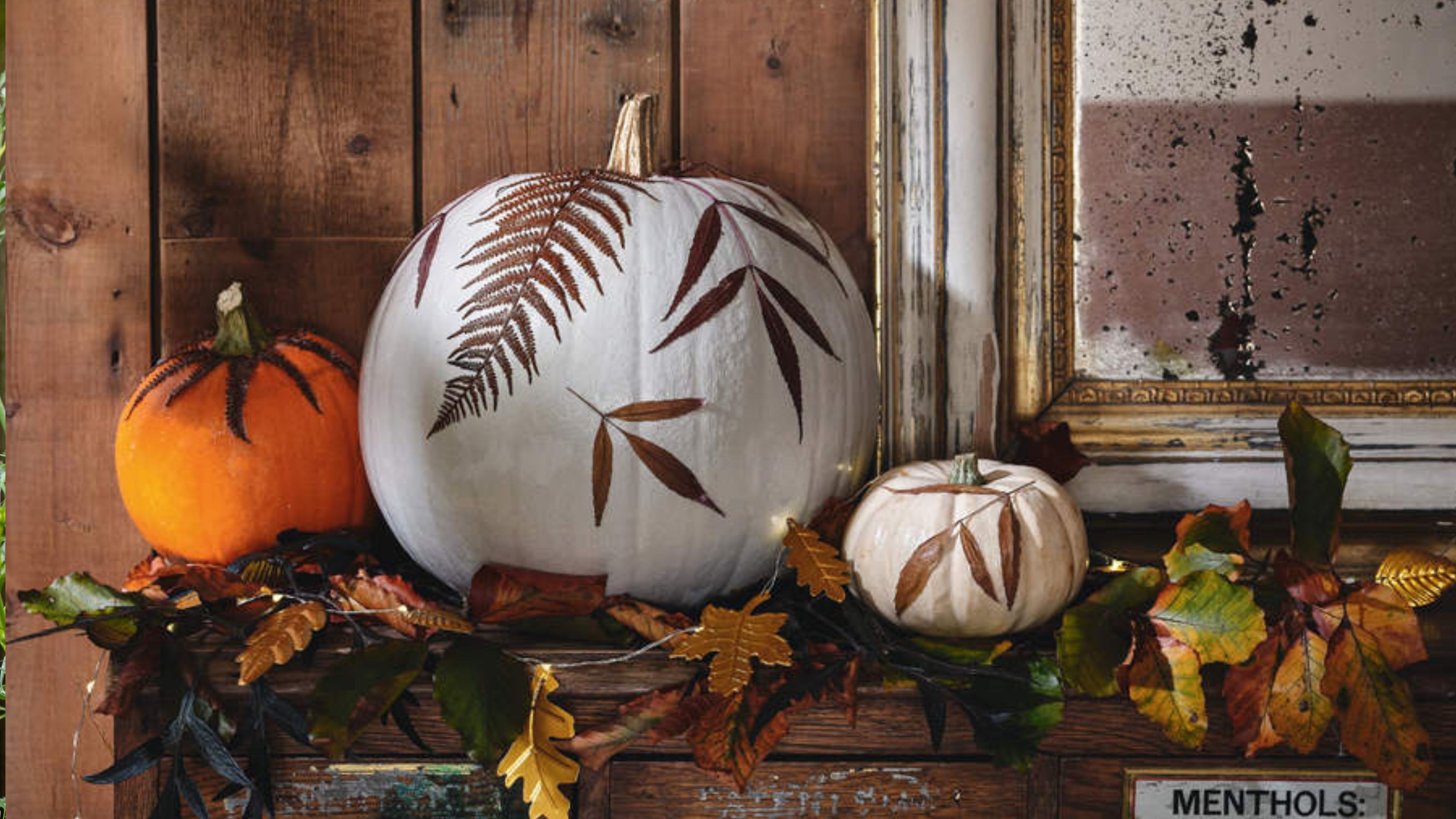 A selection of gourds and pumpkins decorated with leaf prints for Halloween