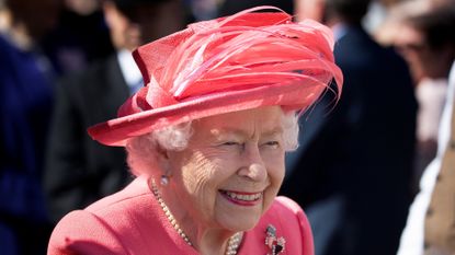 Britain's Queen Elizabeth II attends a garden party at the Palace of Holyroodhouse in Edinburgh