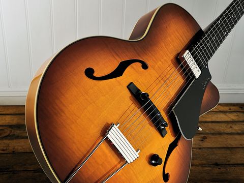 The Godin 5th Avenue Jazz is available faced with flame maple or in an all-black version.