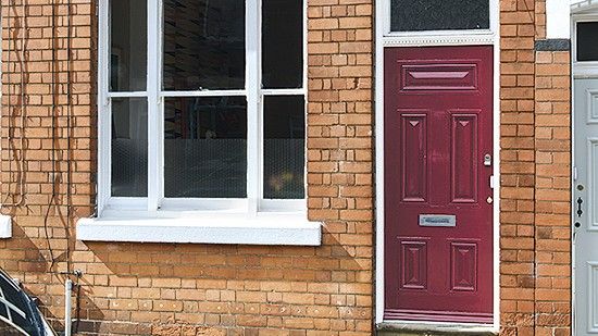 brickhouse with red front door