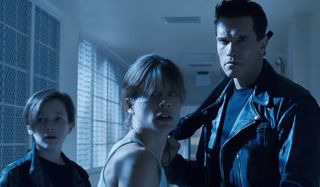 Terminator 2: Judgment Day John Connor, Sarah Connor, and the T-800 escaping the psychiatric facility