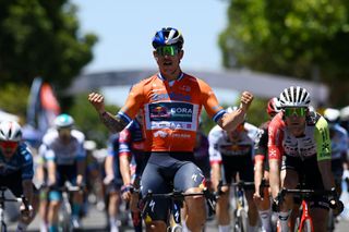 TANUNDA AUSTRALIA JANUARY 22 Sam Welsford of Australia and Team Red Bull BORA hansgrohe Orange Santos Leaders Jersey celebrates at finish line as stage winner during the 25th Santos Tour Down Under 2025 Stage 2 a 1288km stage from Tanunda to Tanunda 342m UCIWT on January 22 2025 in Tanunda Australia Photo by Dario BelingheriGetty Images