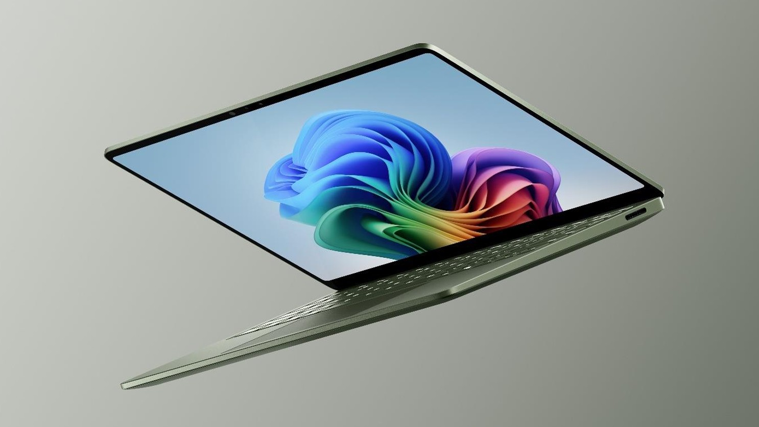 Surface Laptop open with Windows 11 wallpaper