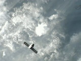 SpaceX's Dragon space capsule is seen as it approaches the International Space Station in this view from a camera on the station's exterior on Oct. 10, 2012. The Dragon capsule is flying the first U.S. commercial cargo mission to the station for NASA.