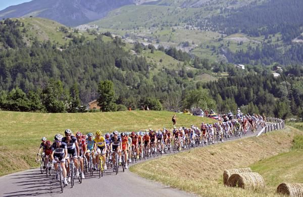 Team Saxo Bank sets tempo at the head of the peloton.
