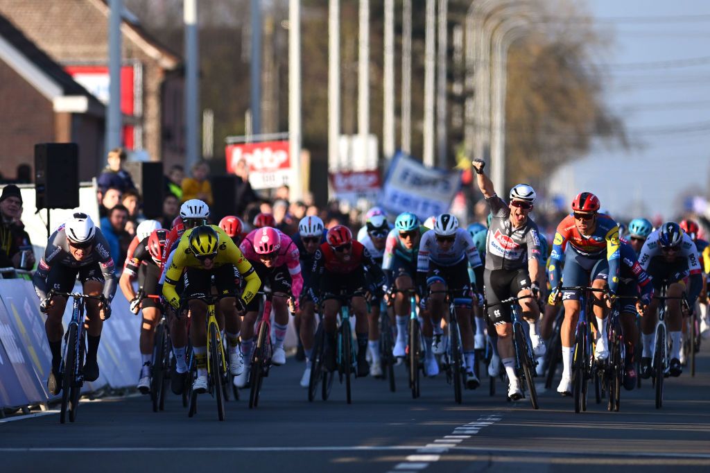 KUURNE BELGIUM MARCH 02 LR Race winner Jasper Philipsen of Belgium and Team AlpecinDeceuninck Olav Kooij of Netherlands and Team Visma Lease a Bike Kaden Groves of Australia and Team AlpecinDeceuninck and Jonathan Milan of Italy and Team LidlTrek sprint at finish line during the 77th Kuurne Bruxelles Kuurne 2025 a 1969km one day race from Kortrijk to Kuurne on March 02 2025 in Kuurne Belgium Photo by Luc ClaessenGetty Images