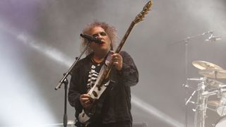 Robert Smith of The Cure performs at OVO Arena Wembley on December 12, 2022 in London, England