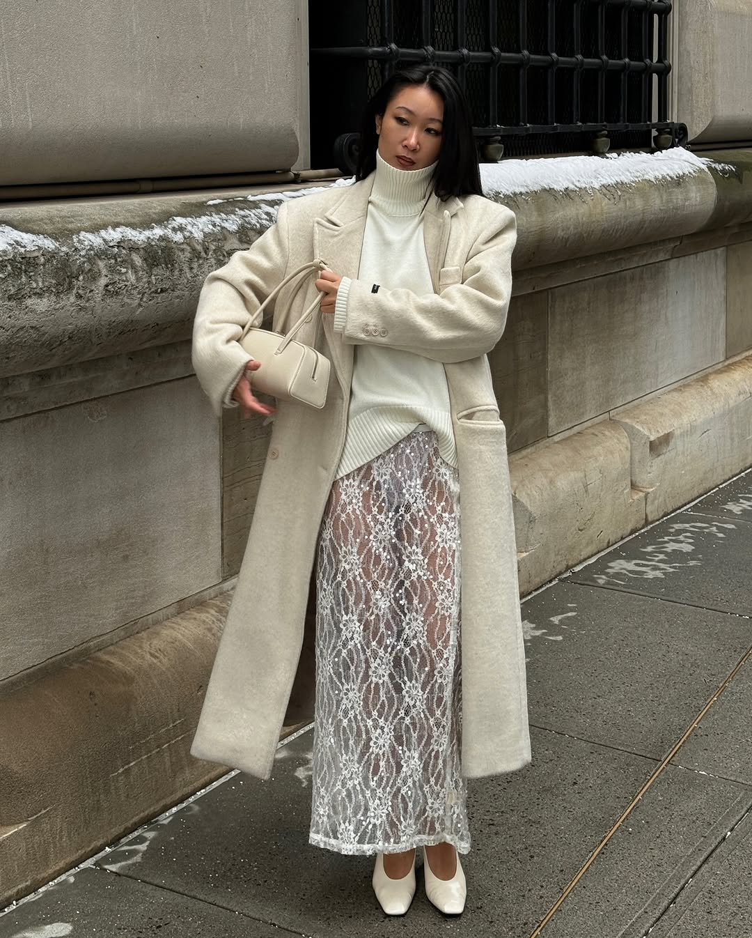 woman wearing cream coat outfit 2026