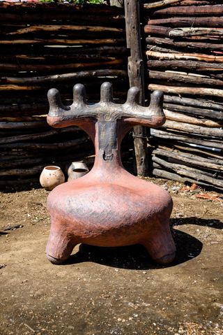 Clay seat by African designer Andile Dyalvane photographed outdoors at the village of Ngobozana, Eastern Cape