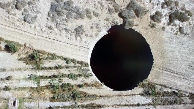 Enormous sinkhole wide enough to swallow the White House opens in Chile