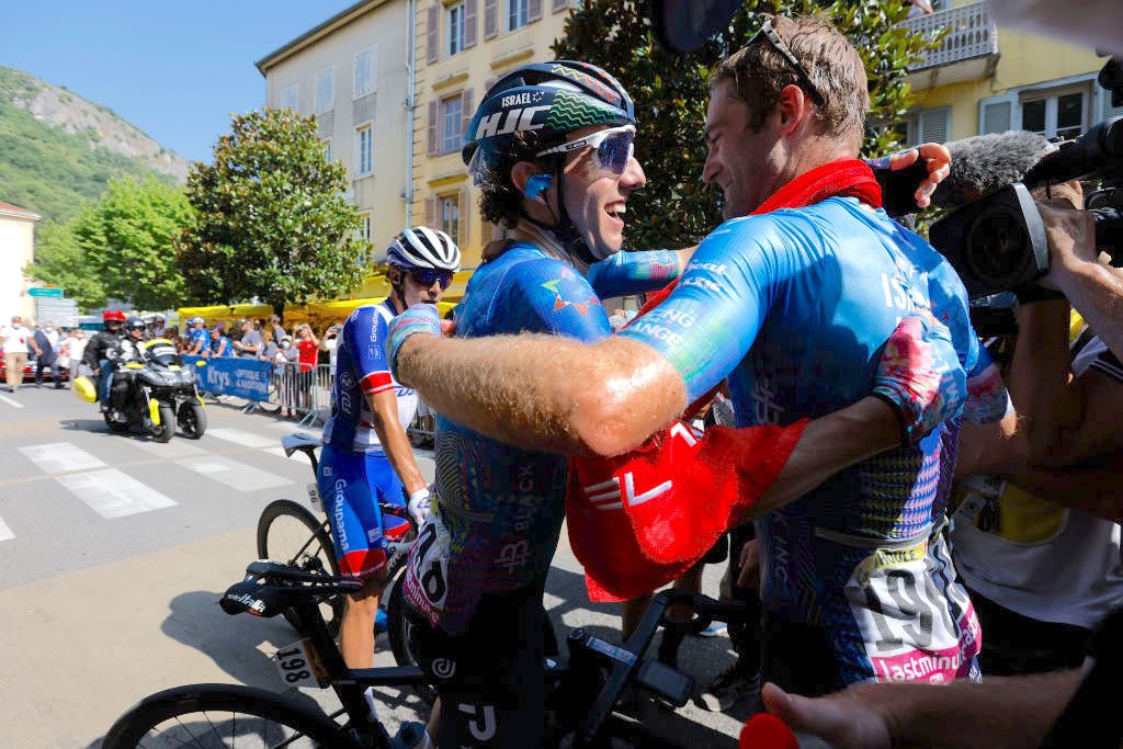 FOIX, FRANCE - JULY 19: Stage winner Hugo Houle of Canada and Team Israel - Premier Tech (R) celebrates at finish line as stage winner with his teammate Michael Woods of Canada (L) during the 109th Tour de France 2022, Stage 16 a 178,5km stage from Carcassonne to Foix / #TDF2022 / #WorldTour / on July 19, 2022 in Foix, France. (Photo by Gonzalo Fuentes - Pool/Getty Images)