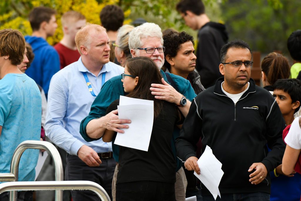 Students are comforted following a school shooting in Colorado.