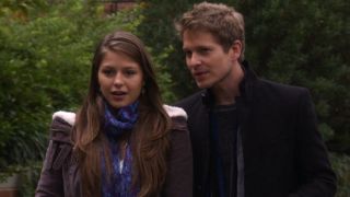 Melissa Benoist walking with Matt Czuchry.