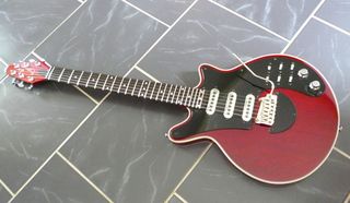 The iconic outline of the Brian May guitar