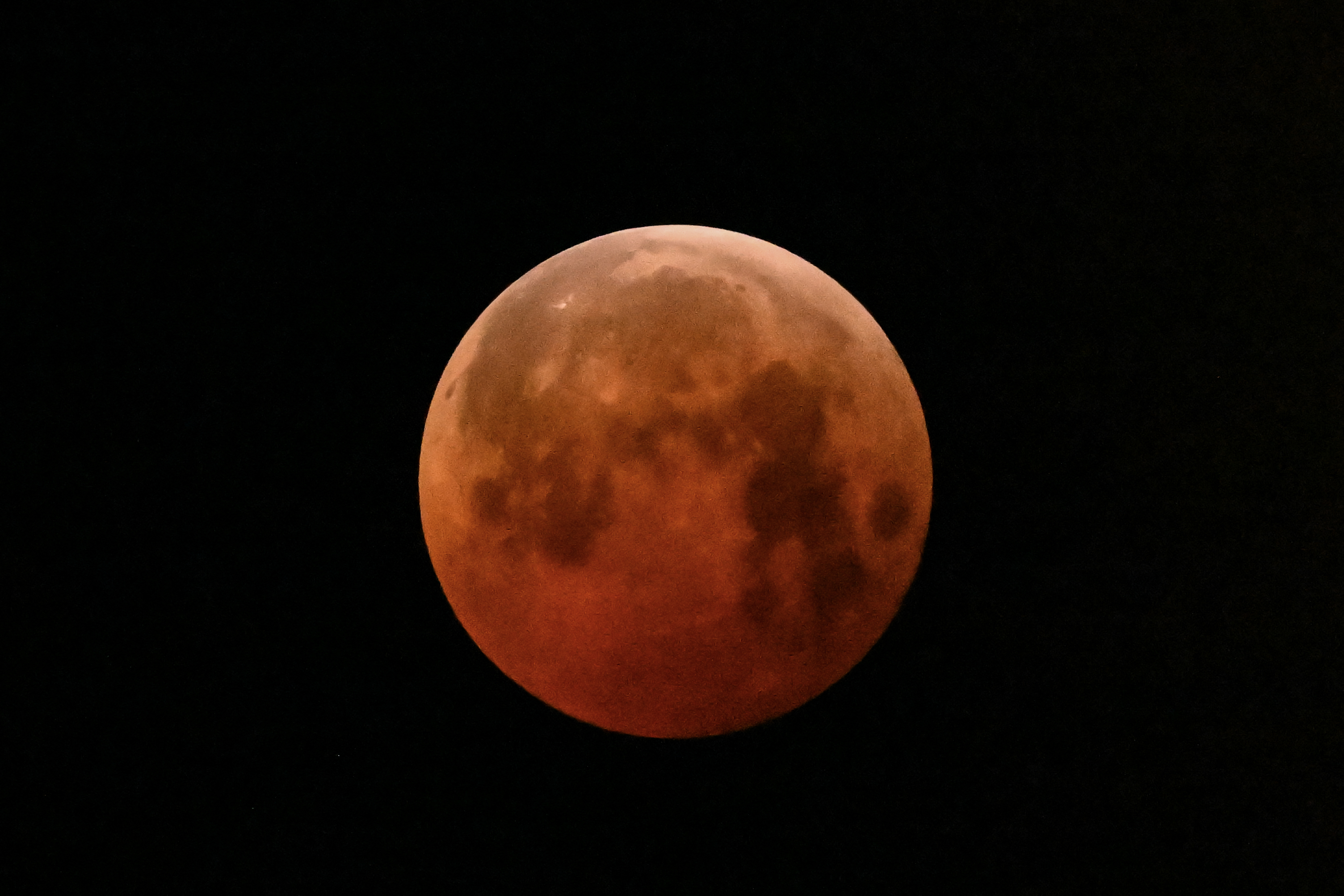 The full moon, also known as the "Blood Moon," is seen in Mexico City on March 14, 2025, during a lunar eclipse. Stargazers across a swathe of the world marvelled at a dramatic red "Blood Moon" during a rare total lunar eclipse in the early hours of March 14.