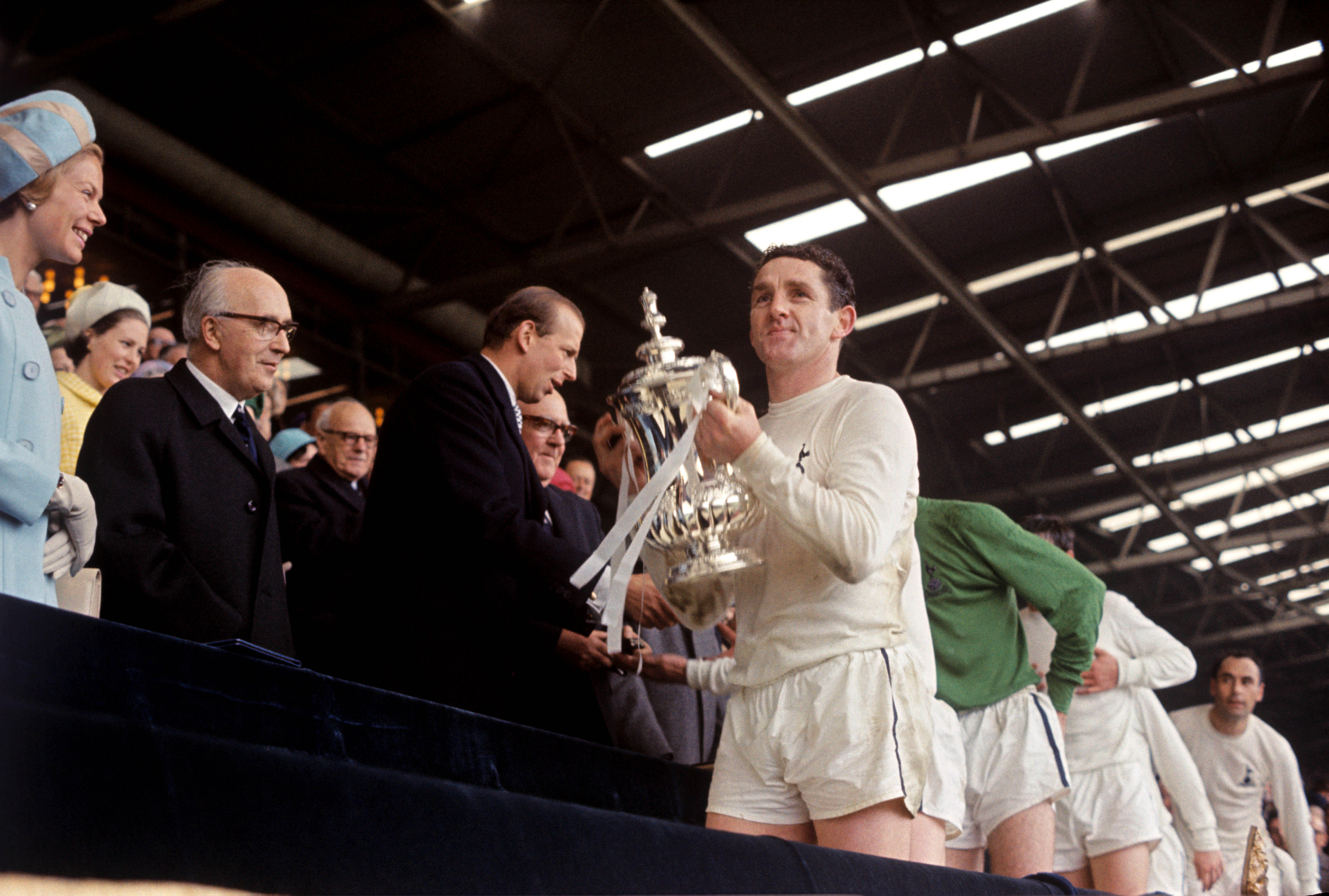 Dave Mackay lifts the FA Cup as Tottenham captain after victory over Chelsea in the 1967 final