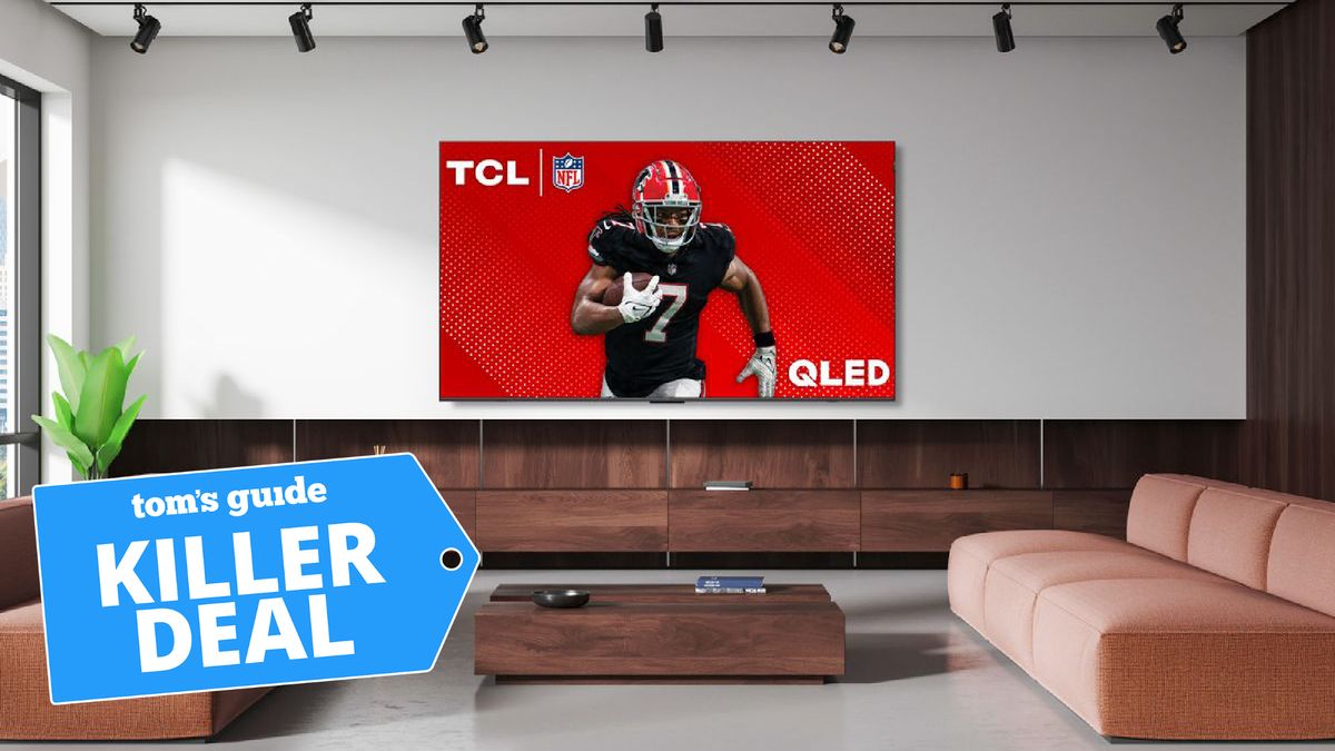 TCl Q6 on stand in living room