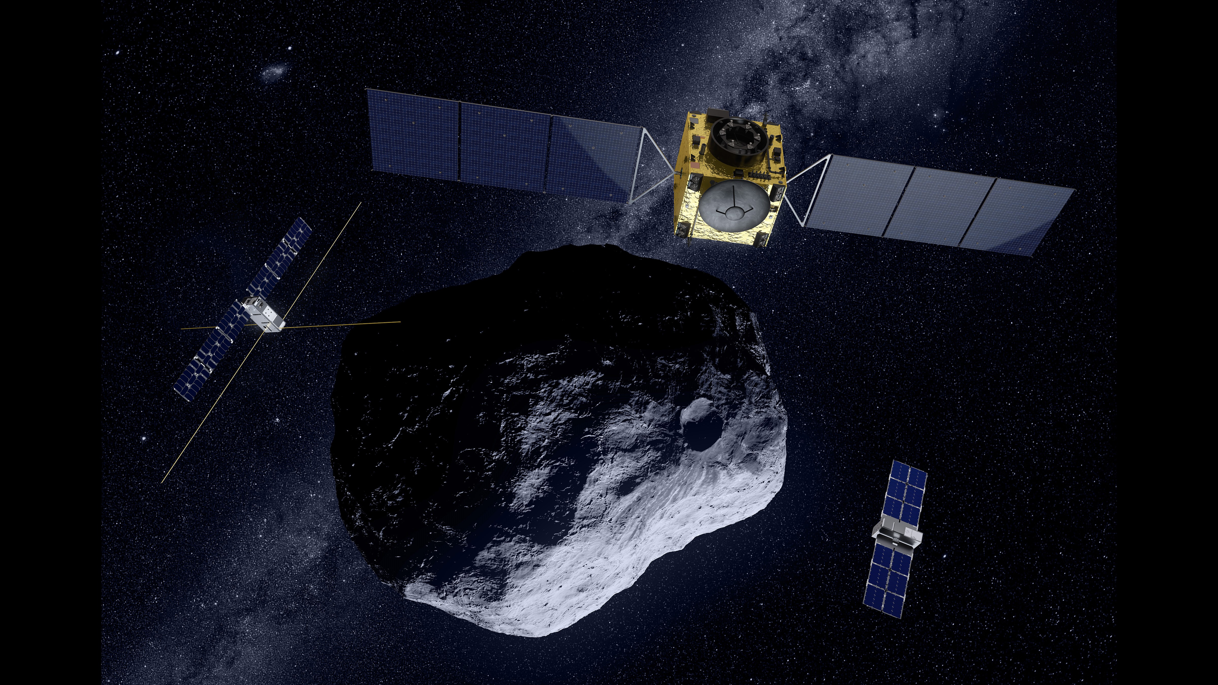 one large spacecraft and two tiny ones seen around a rock with space background