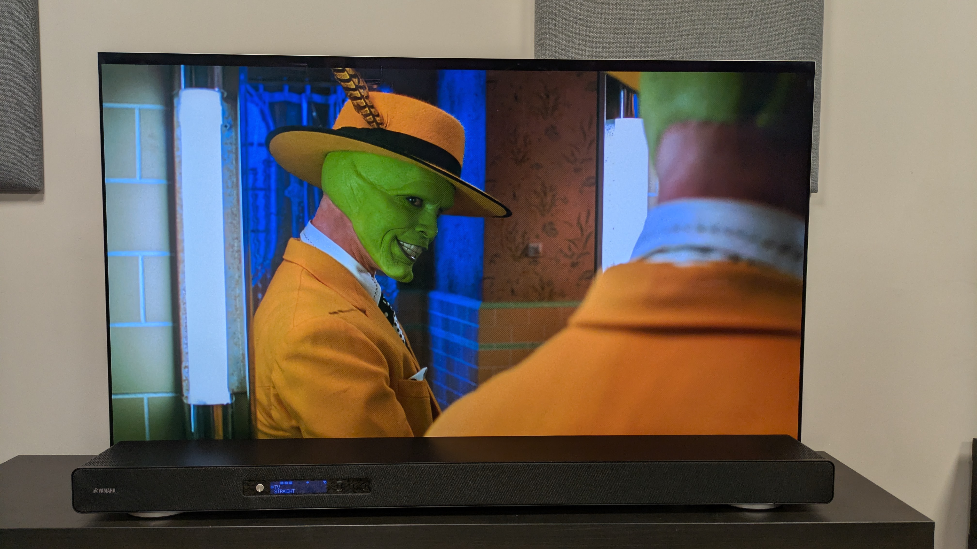 Yamaha True X Surround 90A in front of the LG G5, with The Mask on screen