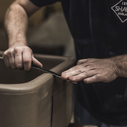 A sink being hand-finished at Shaws of Darwen.