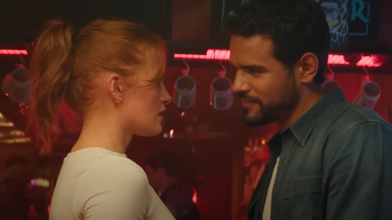 Madelaine Petsch and Jacob Scipio looking at each other in Maintenance Required