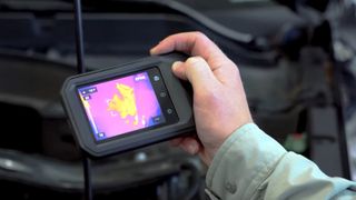 FLIR C8 being used, held in hand