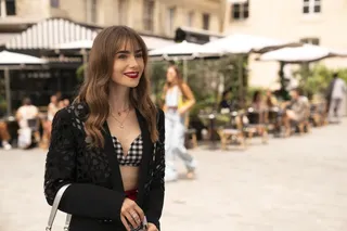 emily in paris wears a gingham bra under a black blazer