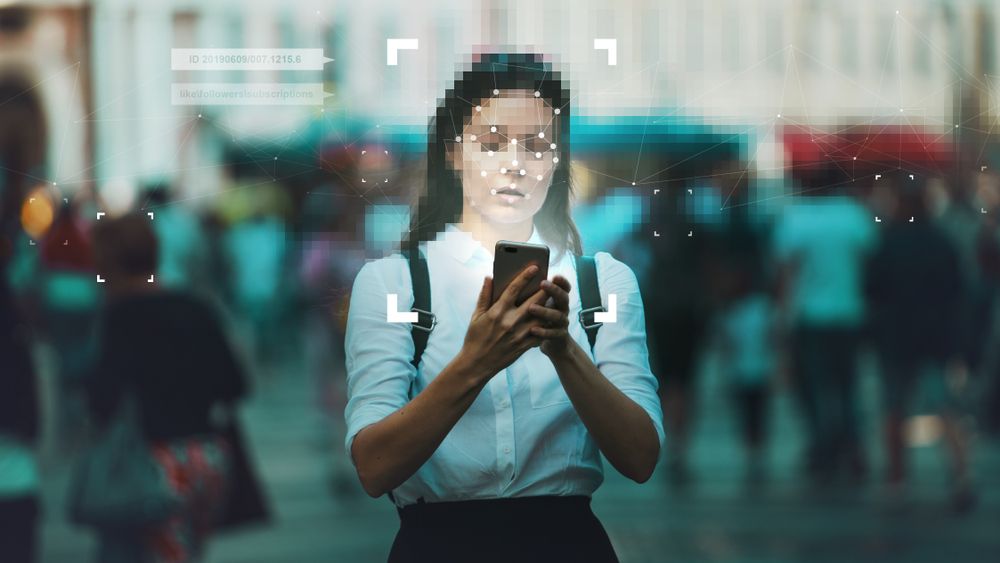 Woman looking down at phone