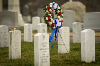 The grave markers of Virgil "Gus" Grissom and Roger Chaffee are seen at Arlington National Cemetery in 2012.