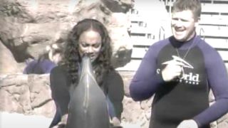 Tyra Banks with a dolphin on Tyra