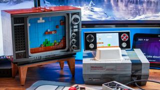 AYANEO Pocket Micro next to LEGO NES Set playing Super Mario Bros.