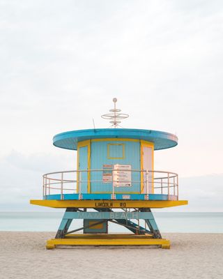green-blue Miami lifeguard tower