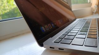 Closeup on the two USB-C ports on the side of a Macbook Air 2020