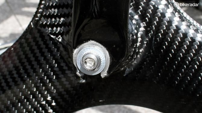 No quick release skewer here: track bolts instead to save a little bit of drag